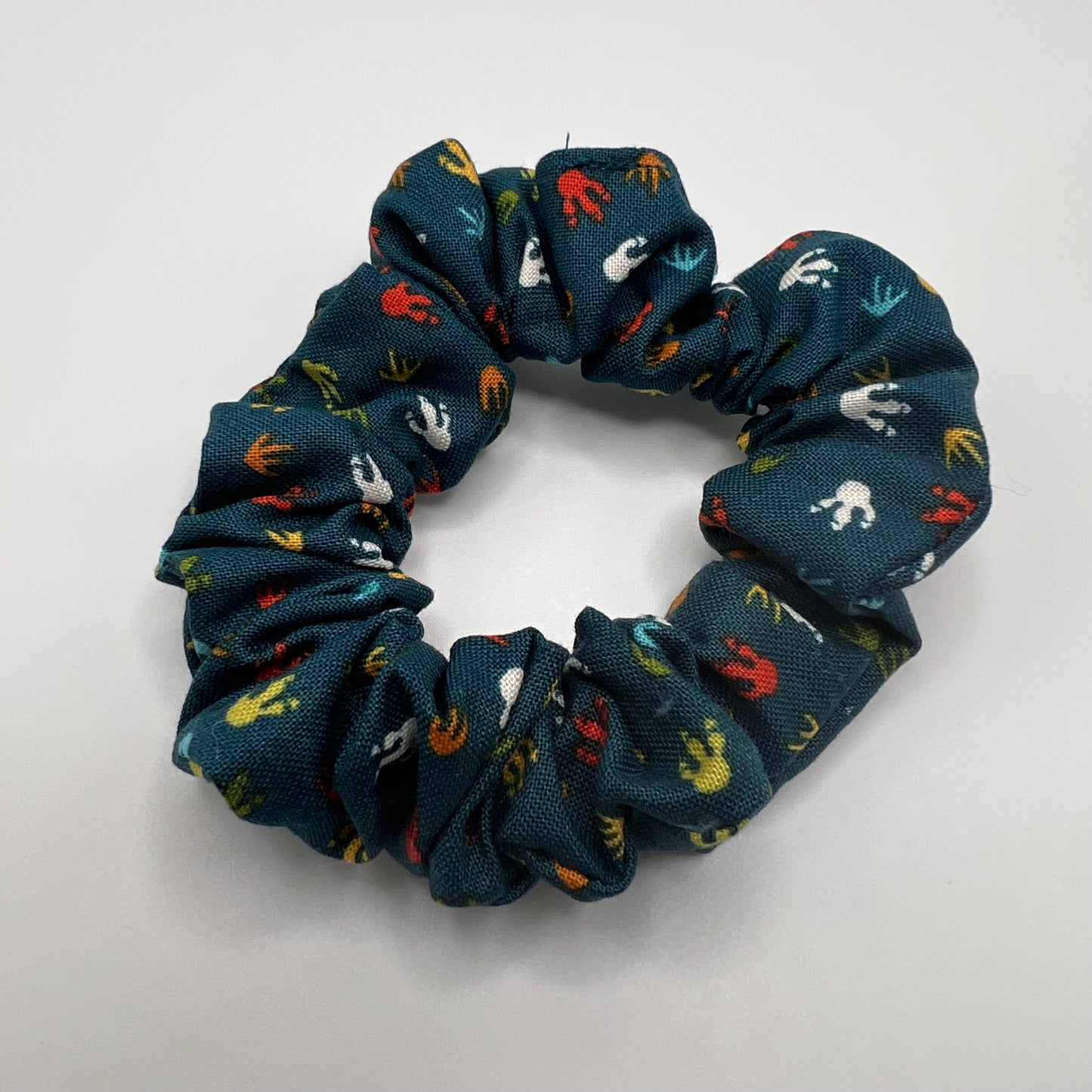 Teal Dinosaur Tracks Scrunchie