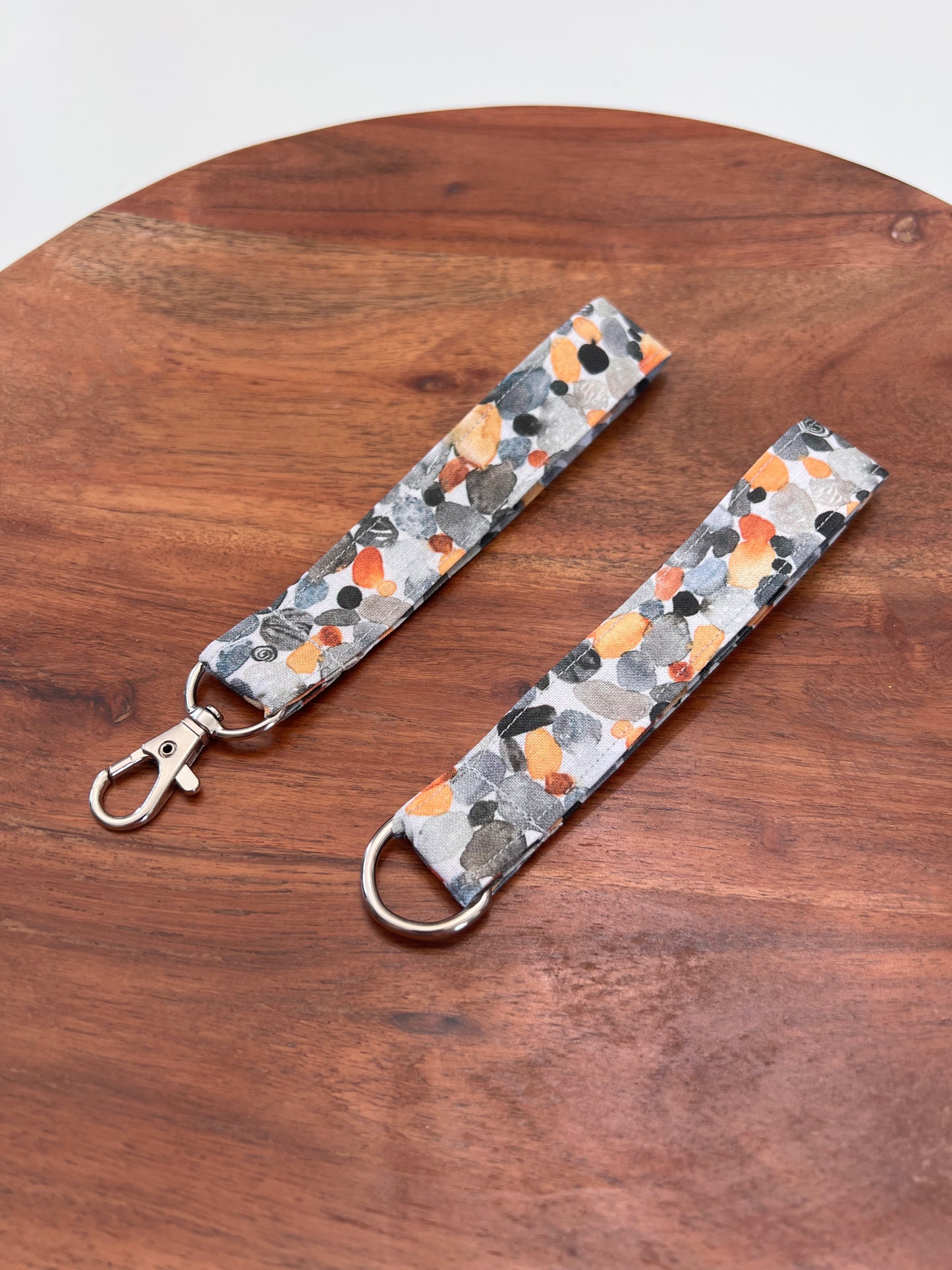 Gray and Orange Pebble Lanyards