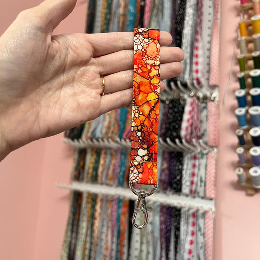 Red, Orange, Yellow Oil Drop Wristlet
