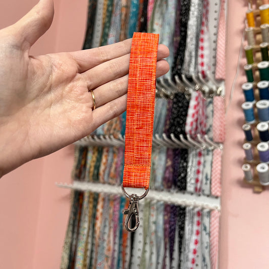 Red and Orange Cross Hatching Wristlet