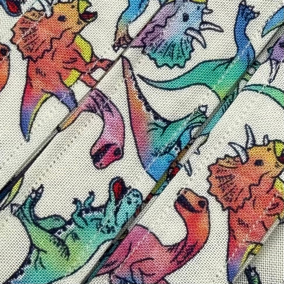 Cream Rainbow Dinosaurs Wristlet/Lanyard