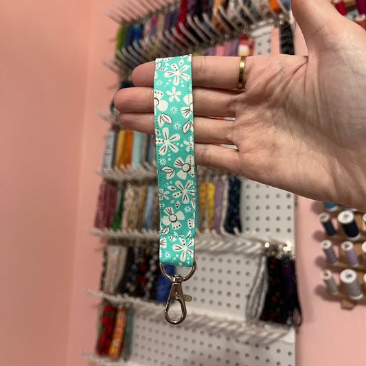 Bright Teal and White Floral Wristlet