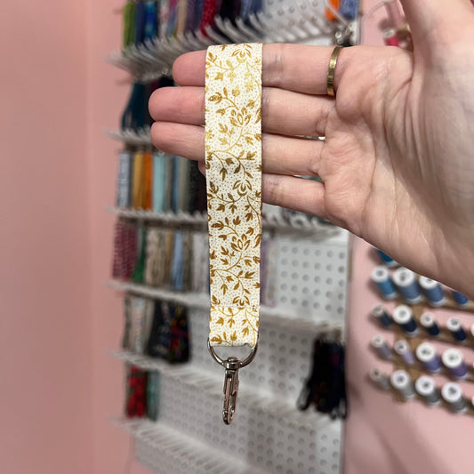 Cream and Gold Floral Wristlet